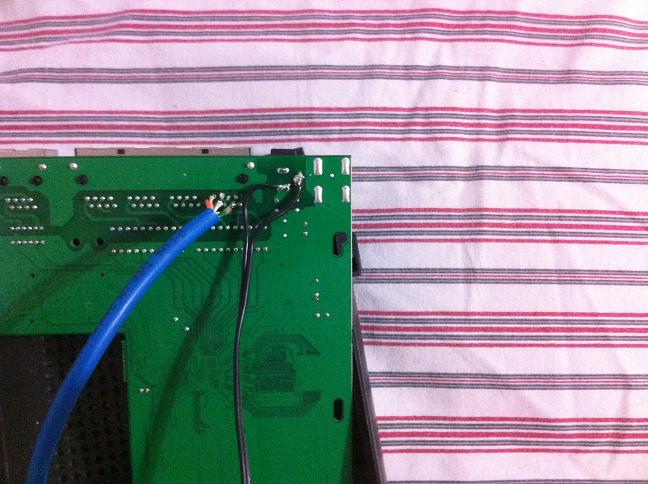 http://www.raspberrypi.org/wp-content/uploads/2011/08/9fsw8-RJ45-and-power-soldered-to-board.jpg