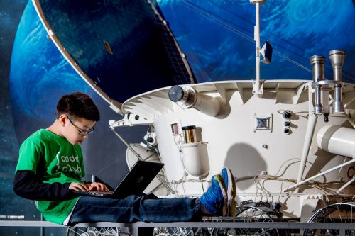 Images of children taking part in Code Club Australia's Moonhack 2017