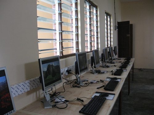 A desk with Raspberry Pis and peripherals