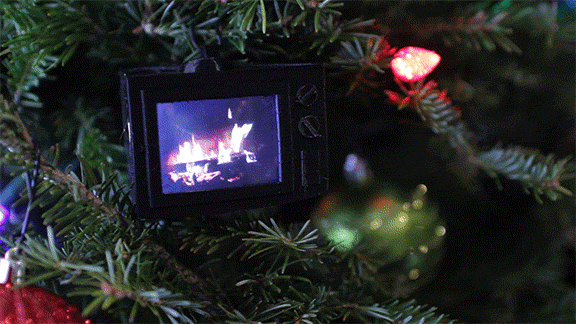 Clip of completed Sean Hodgins Raspberry Pi Christmas ornament in a tree