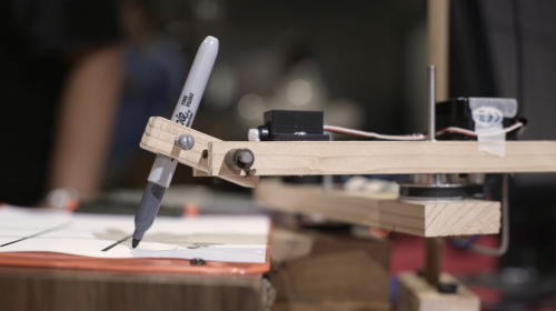Wooden robotic arm playing tic-tac-toe — Toby Goebeler Tic-Tac-Toe arm Raspberry Pi