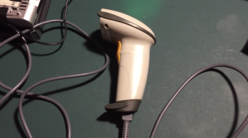 A screenshot from the video showing the laser scanner used for the Raspberry Pi-powered barcode reader