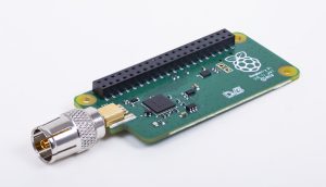 A photograph of a Raspberry Pi a TV HAT with aerial lead connected Oct 2018