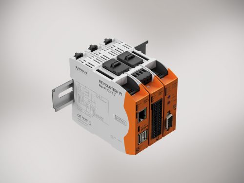 Three smart, compact orange and grey RevPi Core 3 enclosures mounted on a din rail