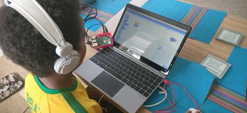 a kid doing digital making at home
