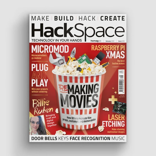 Front cover of hack space magazine featuring a big striped popcorn bucket filled with maker tools and popcorn