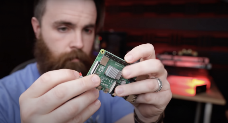 Network Chuck removing SD card from Raspberry Pi 4
