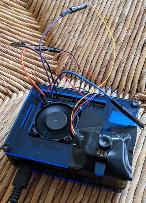 camera attached to raspberry pi in a case