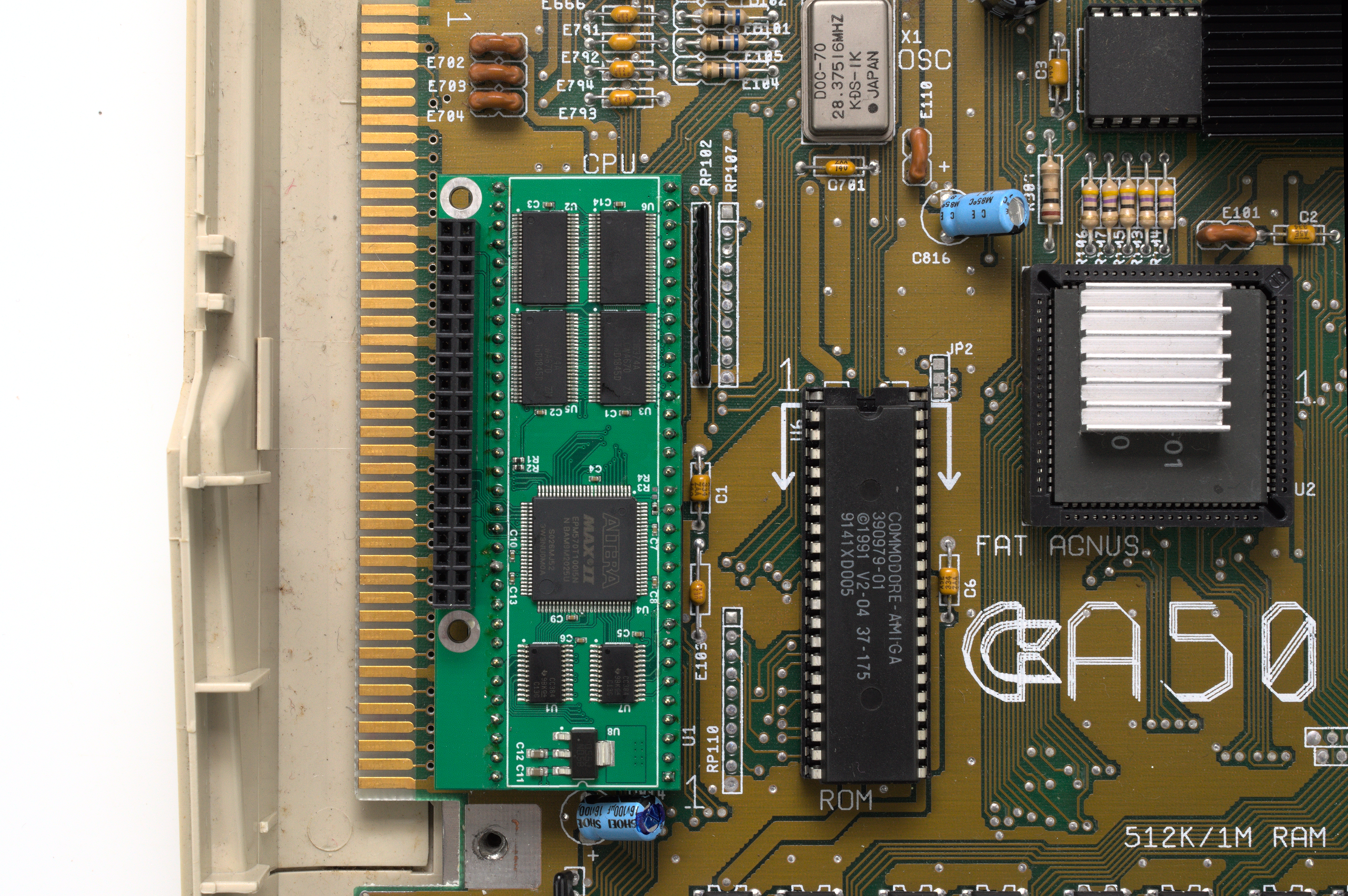 The PiStorm nestles in an Amiga’s CPU socket, with the stock processor removed