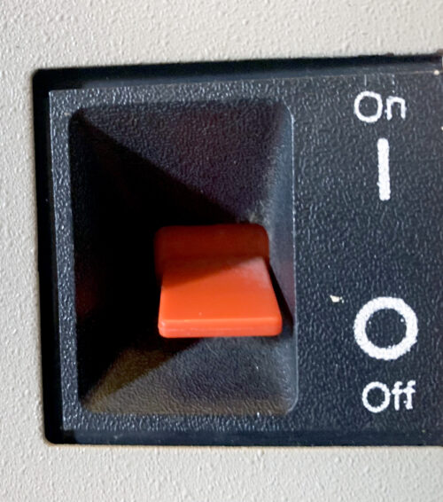 You flip the big red switch (BRS) on the side to power the PC 5150 up or down