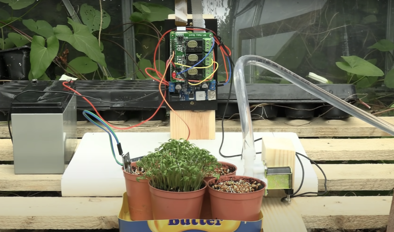 plant watering system full set up in maker's greenhouse