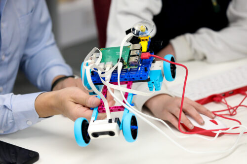 A robot buggy built by young people with LEGO bricks and the Raspberry Pi Build HAT.