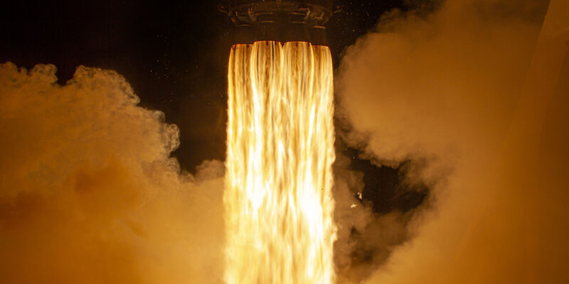 SpaceX’s Falcon 9 rocket carrying the Crew Dragon spits fire as it lifts off from Kennedy Space Center in Florida.