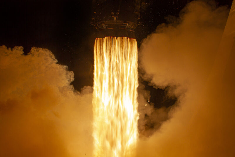 SpaceX’s Falcon 9 rocket carrying the Crew Dragon spits fire as it lifts off from Kennedy Space Center in Florida.