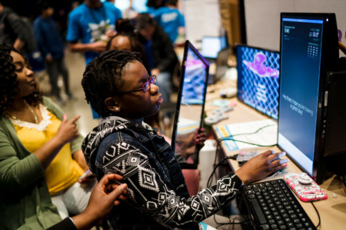 At Coolest Projects, a young person explores a coding project.