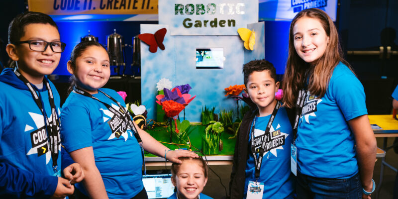 Five young coders show off their robotic garden tech project for Coolest Projects.