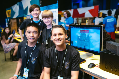 Four young coders show off their tech project for Coolest Projects.