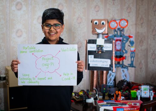 Young coder Jay shows off some of his robotics projects.