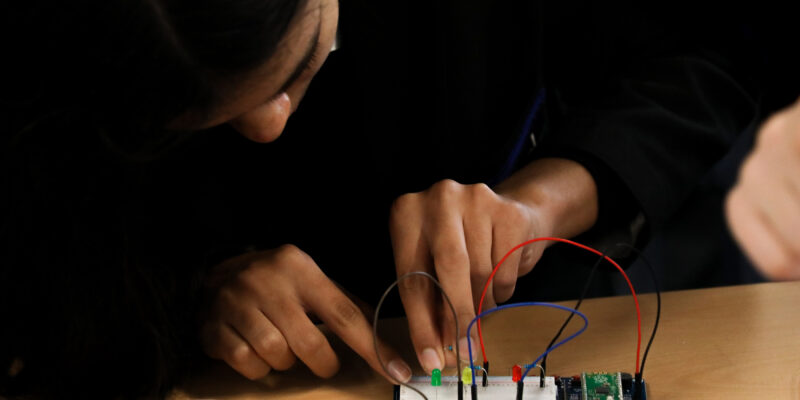 A student uses a Raspberry Pi Pico in the computing classroom.