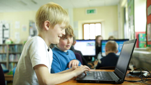 Two learners at a Code Club session.