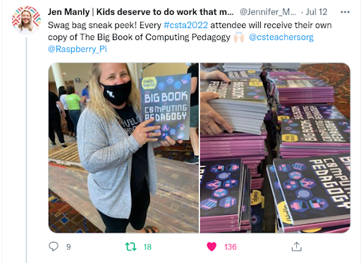 An educator with their copy of The Big Book of Computing Pedagogy.