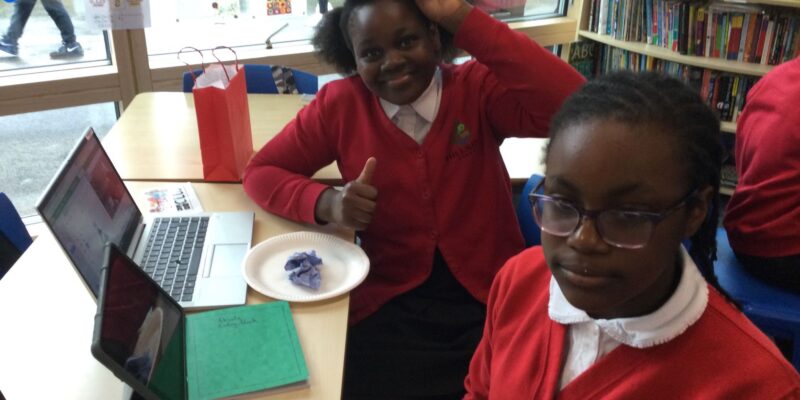 Two young people at a Code Club.