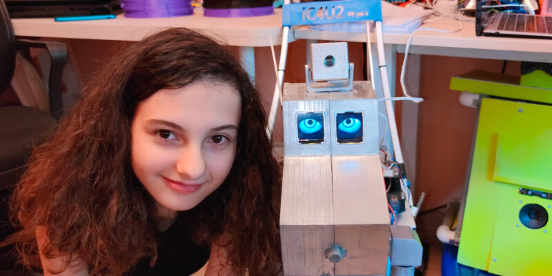 Selin and a robot she has built.