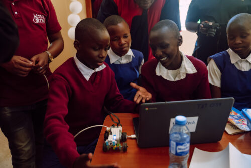 Kenyan children work on a physical computing project.