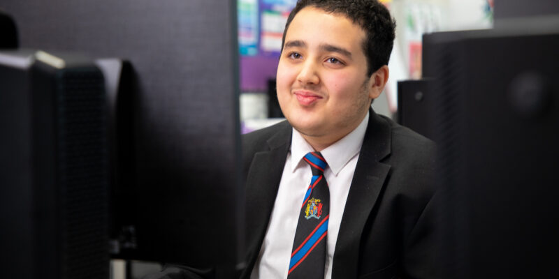 A teenager learning computer science.