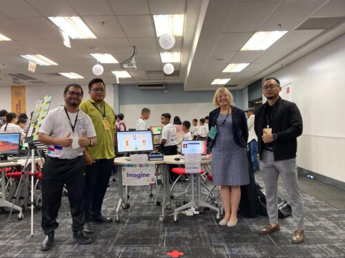 Sue Sentance with teachers showcasing their projects at the STEM Trailblazers event.