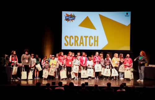 Young tech creators with projects in the Scratch category on stage at Coolest Projects Ireland.