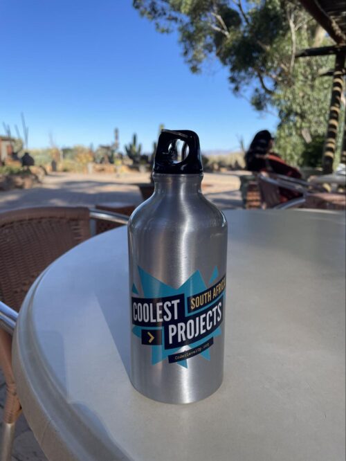 A waterbottle with a Coolest Projects South Africa sticker.