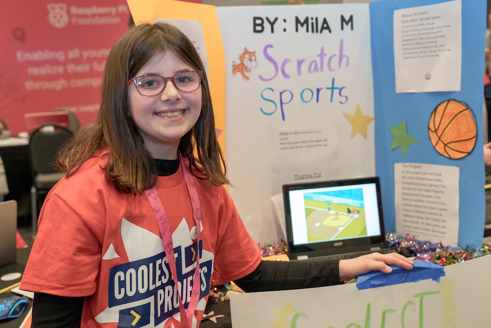 Mila presenting her project at Coolest Projects USA.
