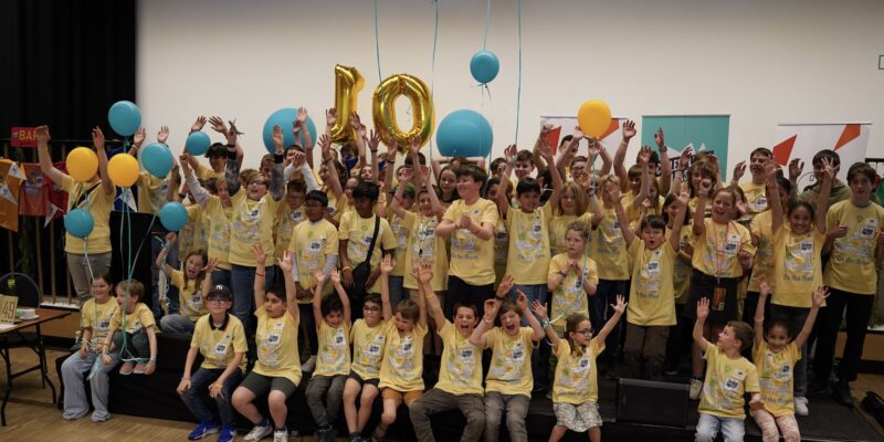 Children celebrating the 10th anniversary of Coolest Projects Belgium.