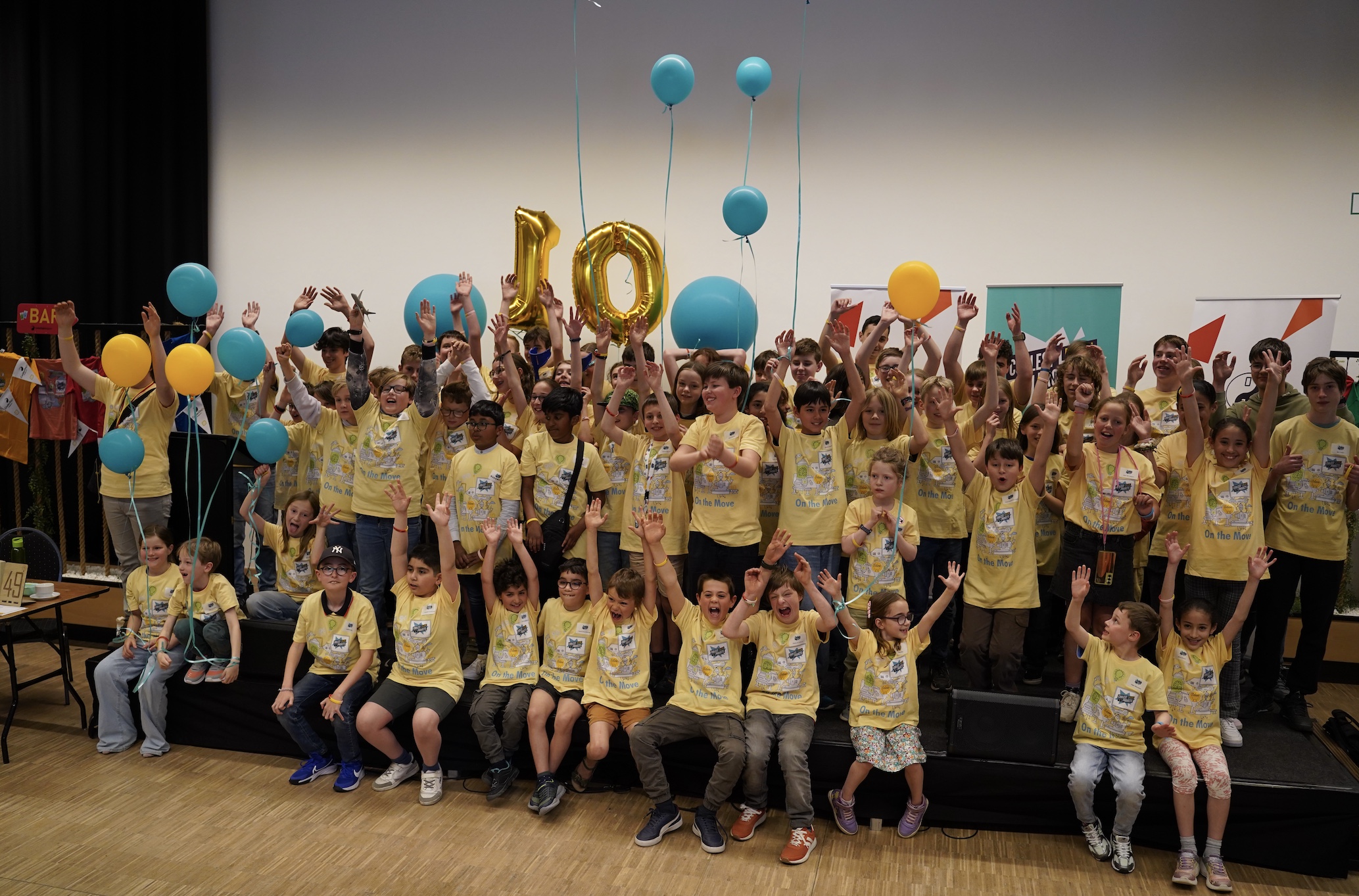 Children celebrating the 10th anniversary of Coolest Projects Belgium.
