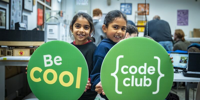 Two young coders at a Code Club.
