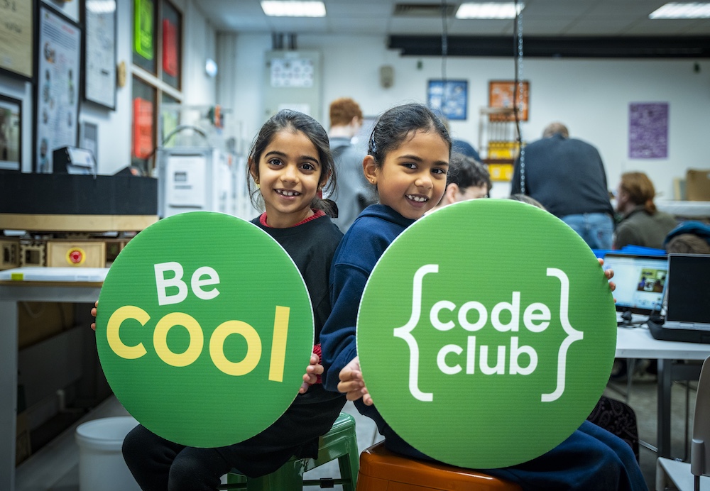 Two young coders at a Code Club.