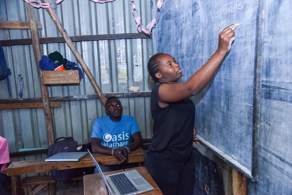 Douglas supporting a Code Club mentor