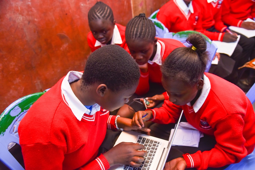 Students at an Oasis Mathare Code Club working together