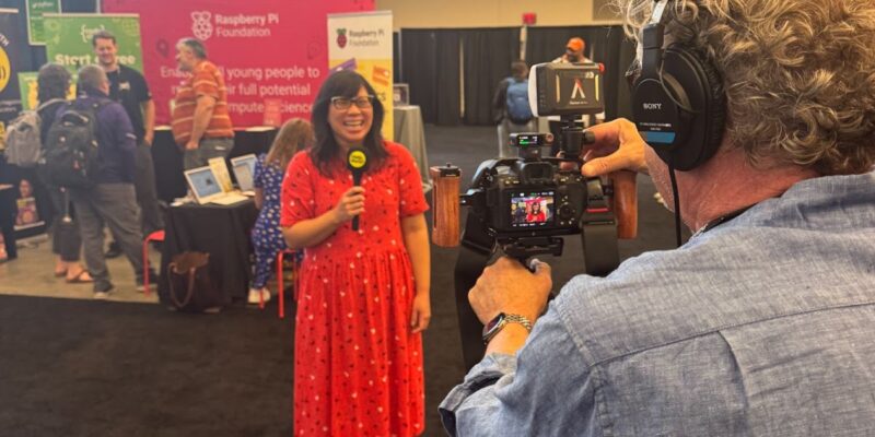 Behind the scenes of Meg Wang, editor of the Hello World magazine presenting the latest episodes of the Hello World podcast, from CSTA 2025.
