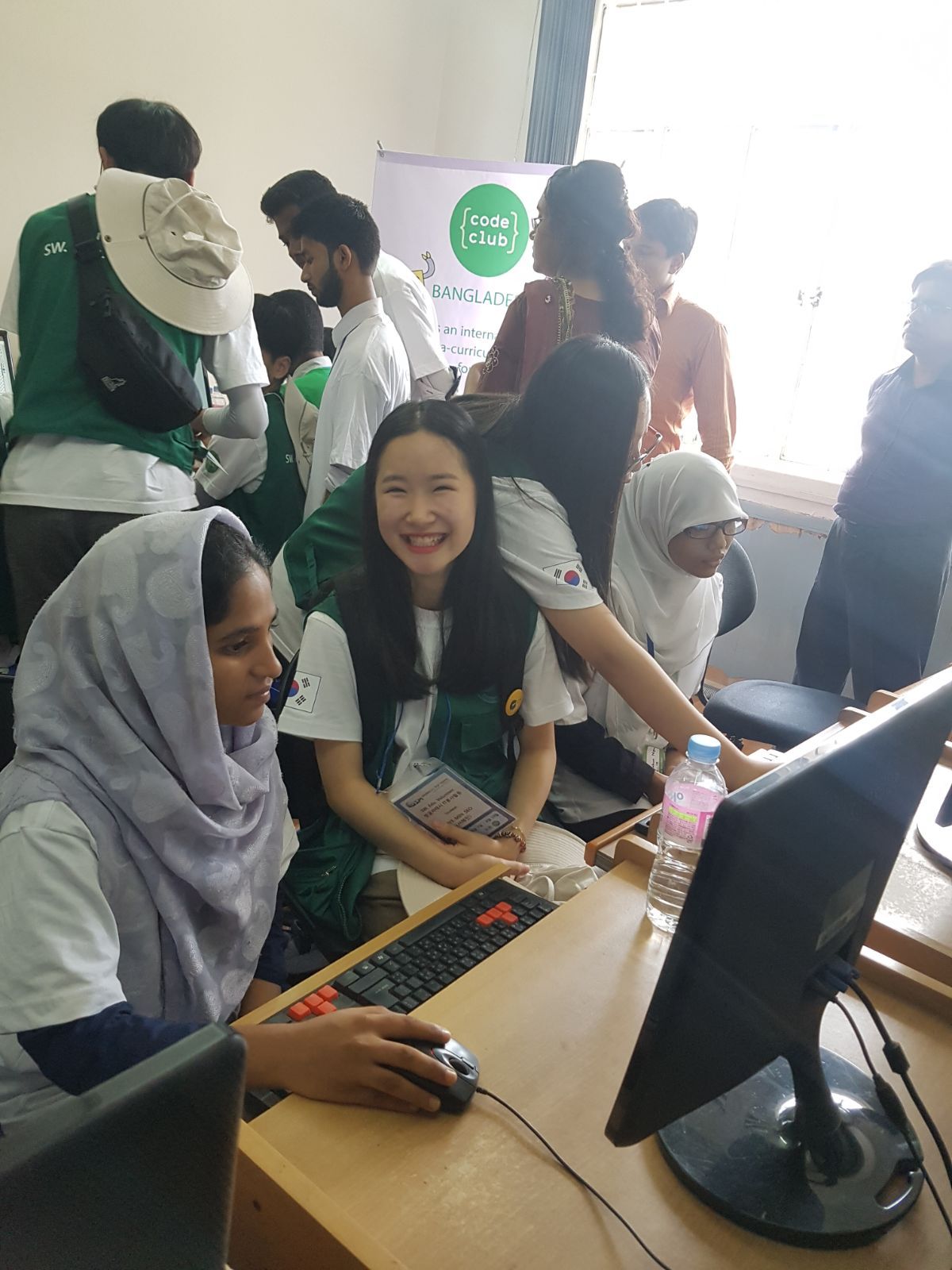 Students from South Korea visiting Code Club Bangladesh.