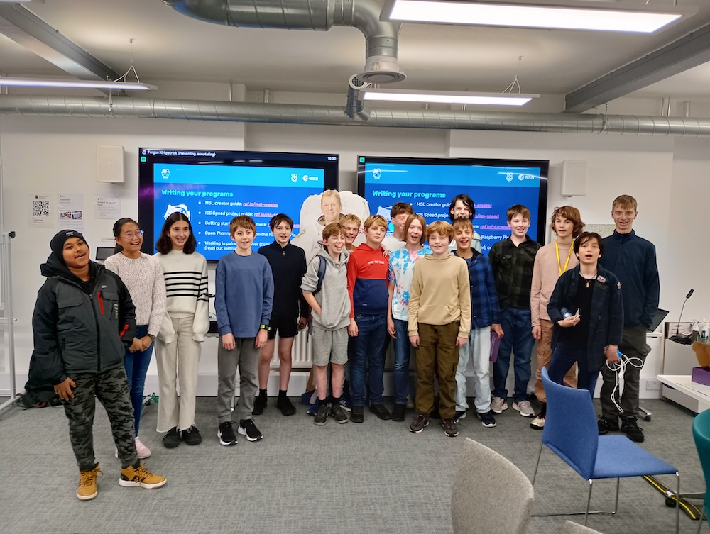 A group of students at a Mission Space Lab hackathon event.