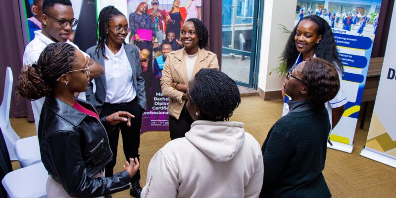 Attendees have a conversation at the Raspberry Pi Foundation's Kenya Partner Showcase 2025.