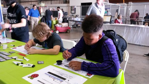 Children paint DOT boards