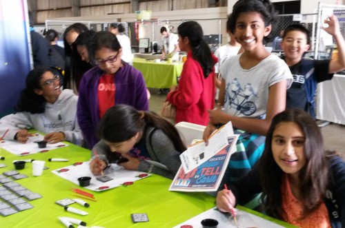 Group of children painting DOT boards