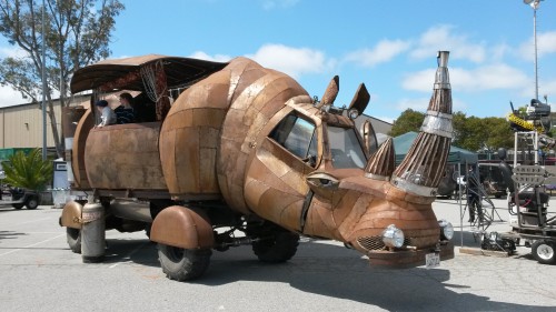 This giant metal-plated fire-breathing rhino has headlamps and a registration plate