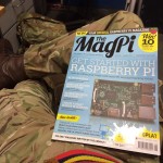 The camouflaged legs of Peter Williams and a MagPi