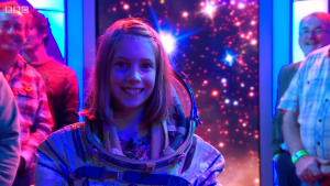 Astro Pi competition winner Hannah Belshaw, wearing an actual space suit